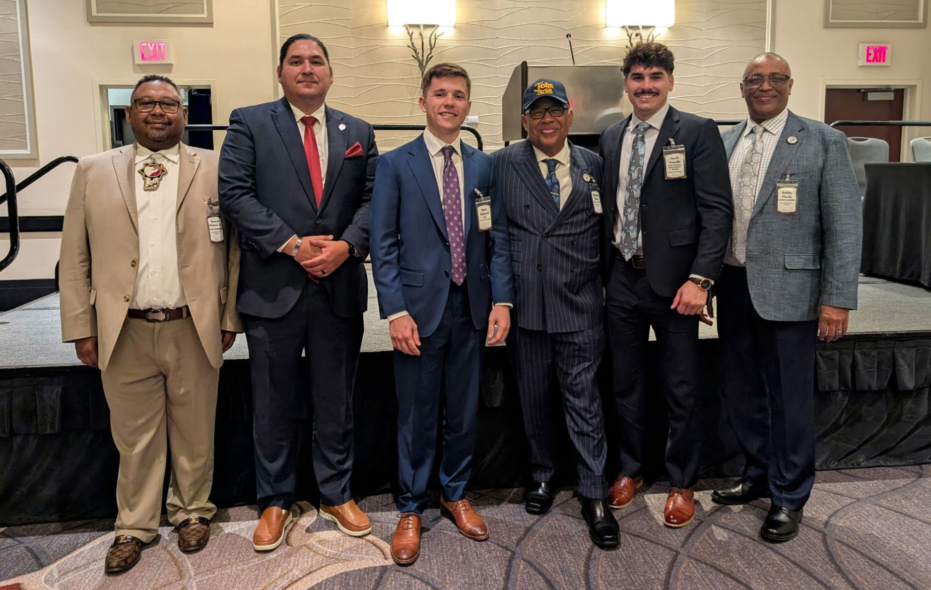Deshotel and Voiselle in a group photo with Native American event particiants.