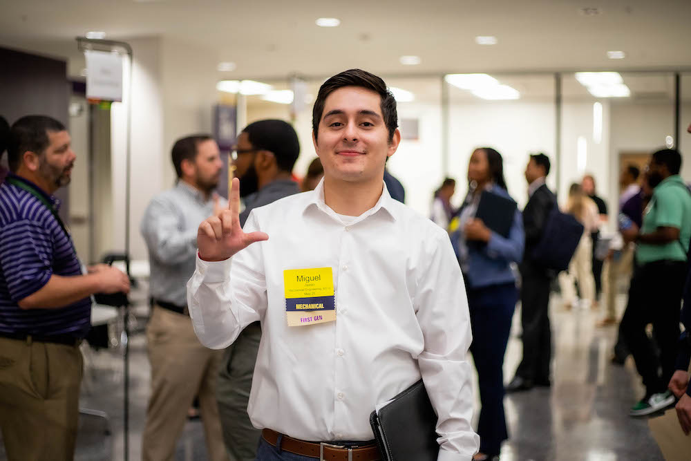 student posing at career fair