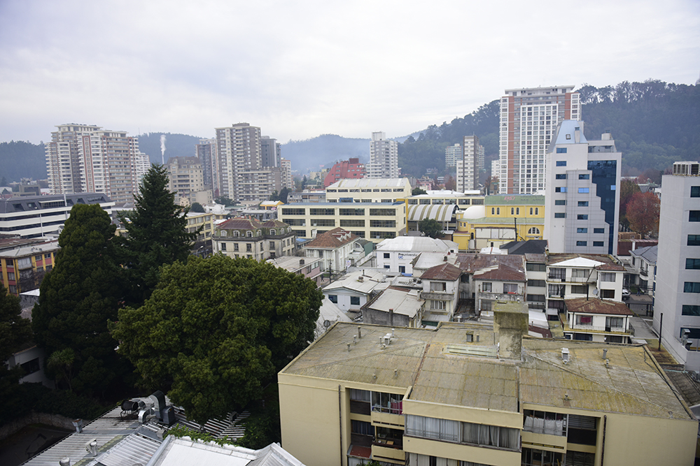 Cityscape of Concepcion Chile with mountains and buildings