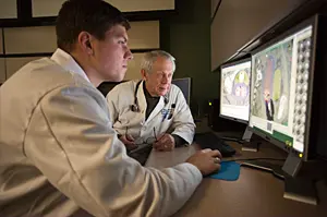 Faculty and student in lab